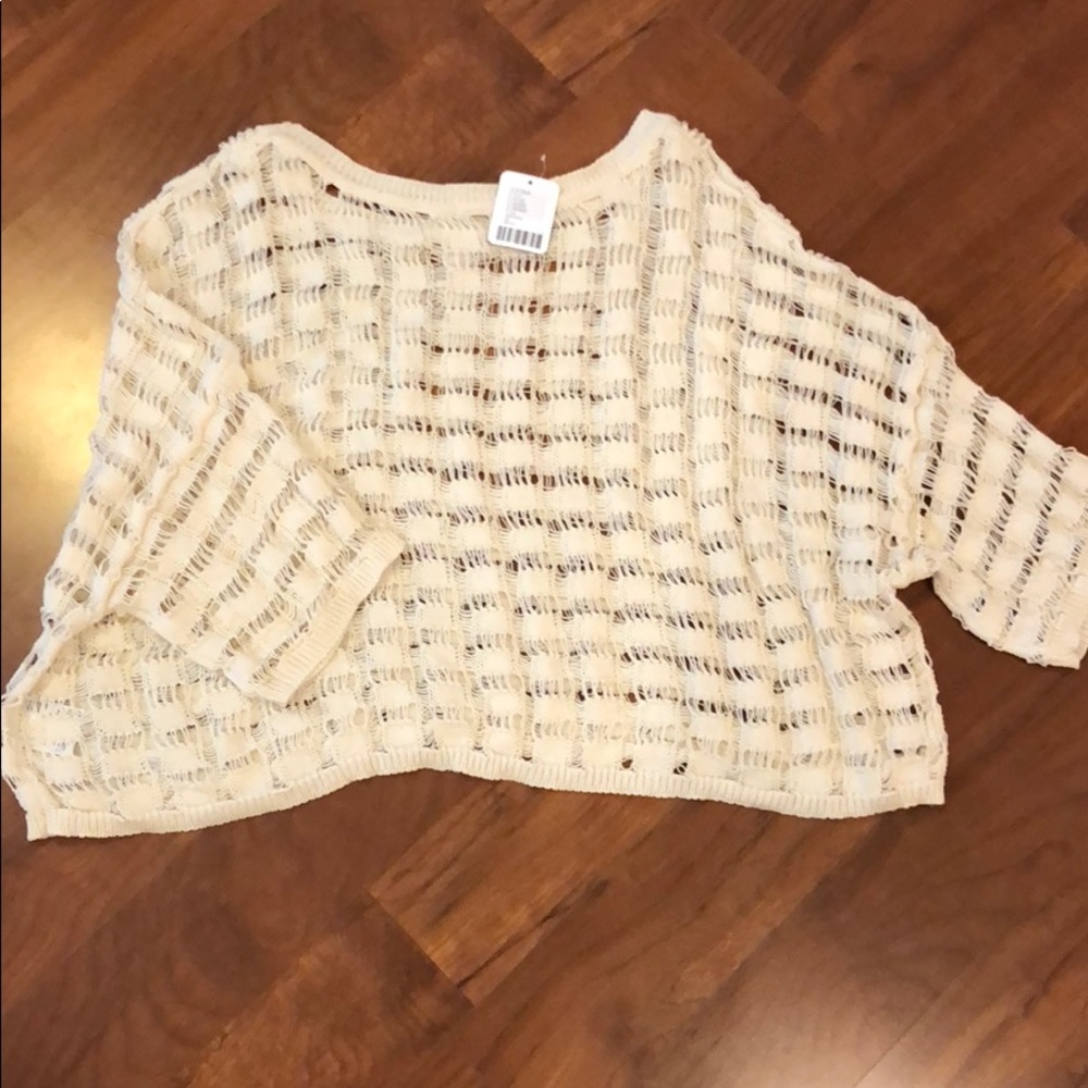 Urban outfitters cream mid length sweater